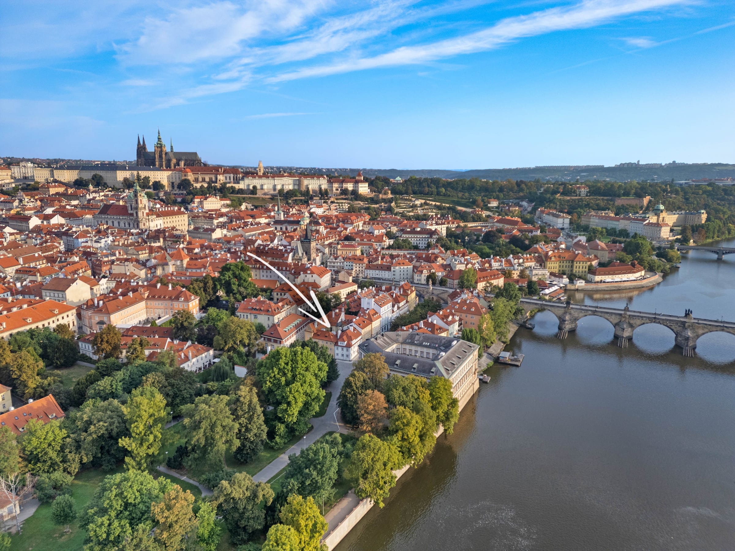 Aerial view of Kampa Island, Charles Bridge and Prague Castle, the Blue Fox House marked with an arrow