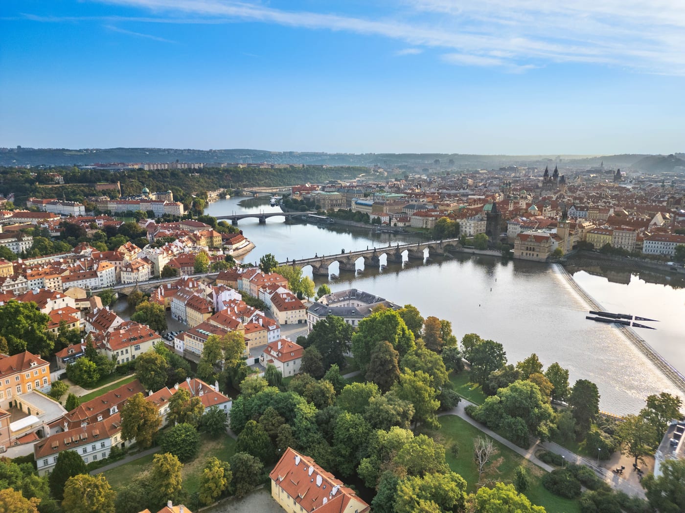 Kampa and the Vltava from above in evening light, the bridges and the Old Town