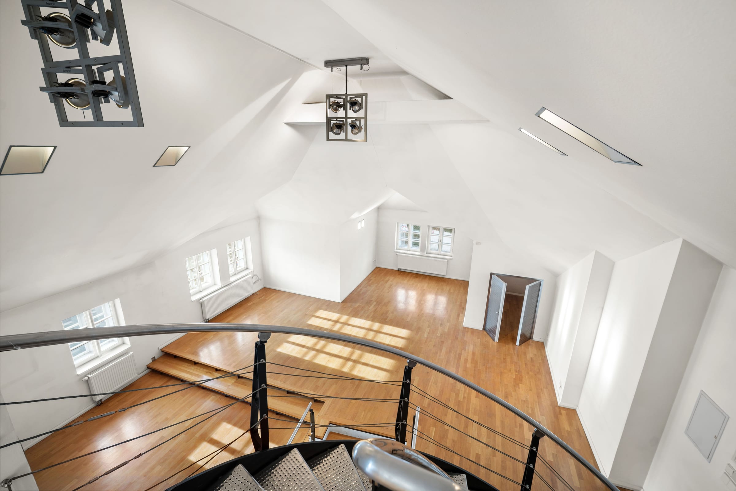 Attic from the gallery: looking down into the hall with roof windows